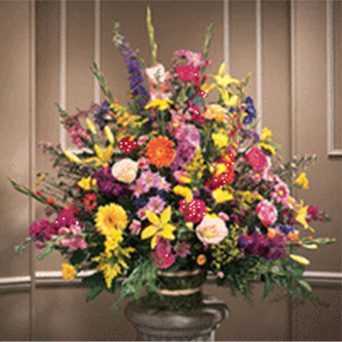 A large bouquet of flowers in a vase.