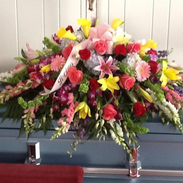 A bouquet of flowers on top of a table.
